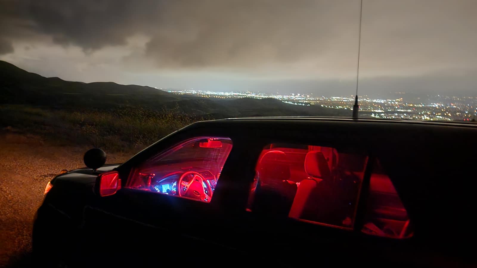 Night patrol above the city lights - in-unit view