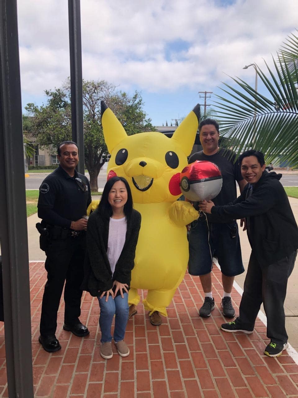 Officers with guests at a community fair